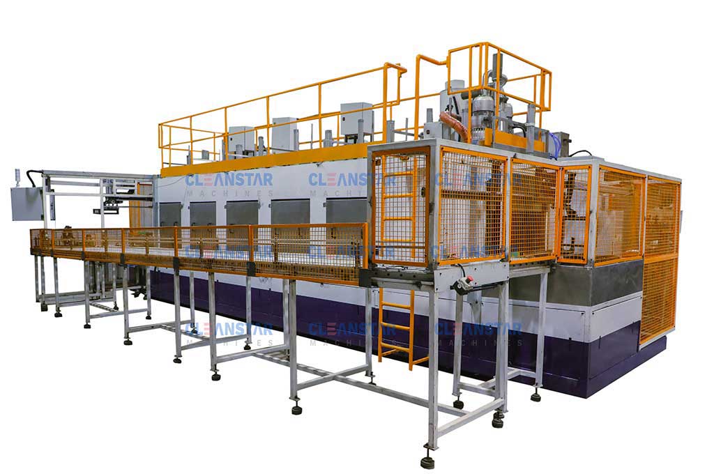 side view of component cleaning machine with return conveyor